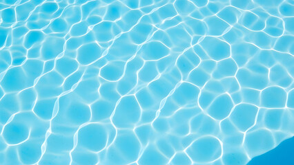 Obraz premium A close-up view of rippling water with bubbles and light reflections