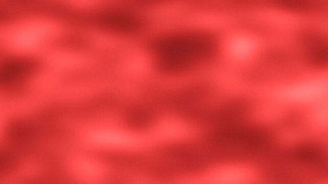 Soft abstract red texture with a blurred appearance and gentle gradients