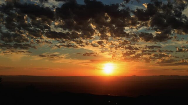 Inspirational Sunset with Sun and Clouds Zoom In Timelapse