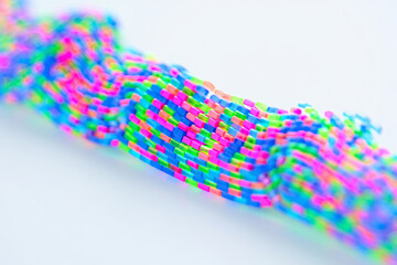 Neon colorful fiber optic cable, blurred background, for technology or science mockup, isolated on white background