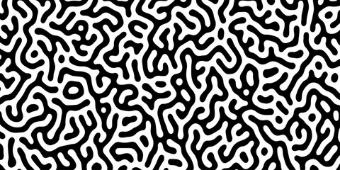 Fototapeta premium Abstract black and white pattern of swirling lines and shapes. High contrast turing pattern of black meandering lines on a white background, concept for abstract backgrounds, textile prints,decoration