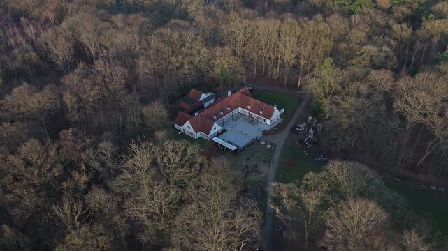 Drone Orbit Around White Forest Caf&eacute; in Bulskampveld Park, Belgium | FlyLens
