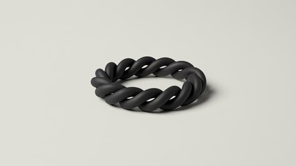 Black spiral hair tie, matte rubber texture, elastic hair accessory isolated on white