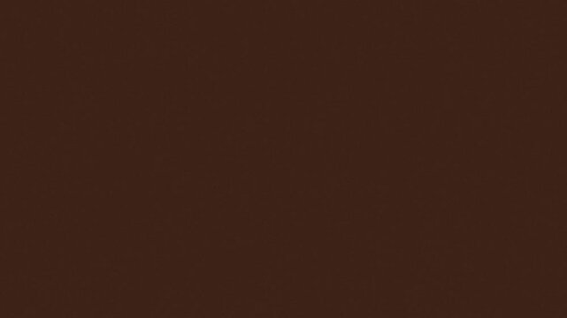 A plain brown background with a textured appearance, offering a warm feel