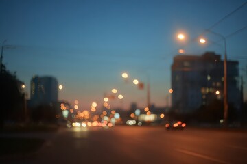Abstract Cityscape at Dusk with Blurry Streetlights and Cars Passing By in Soft Focus Urban Scene Under a Deep Blue Sky Evening Glow