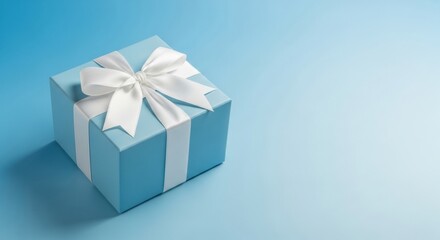 Obraz premium Light Blue Gift Box with White Satin Ribbon Bow on Matching Blue Backdrop
