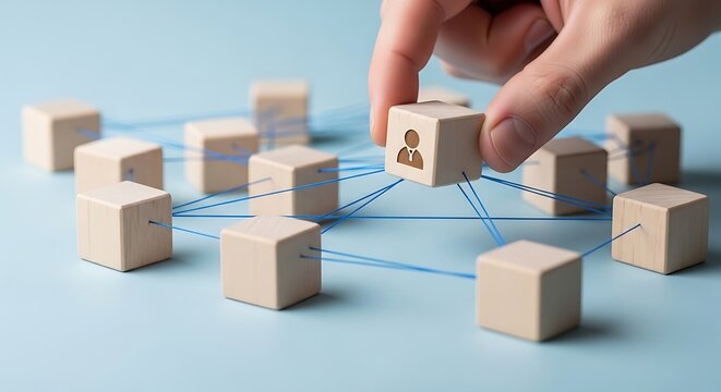Connecting people through networking and teamwork with wooden blocks