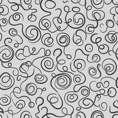 Abstract black swirls and curls pattern on a light gray background for decorative design elements