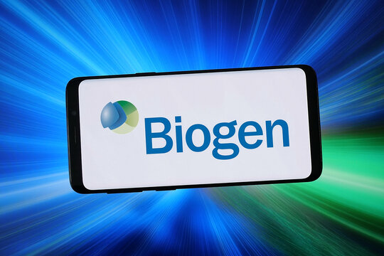 Stuttgart, Germany - 02-04-2026: In this photo illustration, the logo of US biotechnology company Biogen Inc. is displayed on a smartphone in front of abstract background on computer screen.