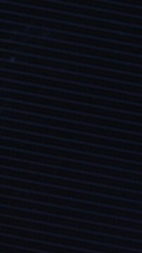 Macro view of plasma tv screen pixels turning on and off