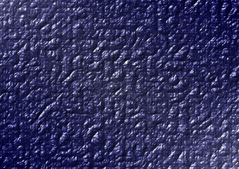 A macro closeup of a dark blue fabric textile material featuring a rough surface pattern design for a textured wallpaper backdrop