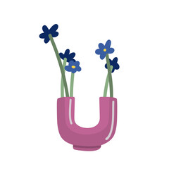Blue flowers in trendy vase on white