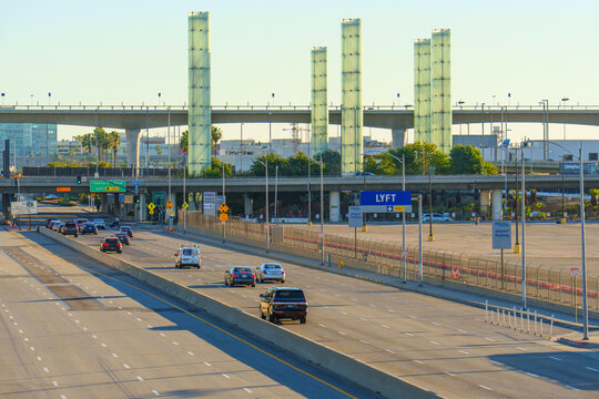 Los Angeles, California - January 12, 2026: LAX Airport Entrance with Iconic Light Pillars and Traffic Los Angeles