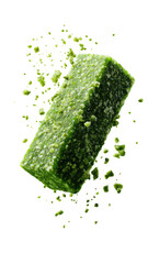 Textured emerald green rectangular confectionery bar, with scattered particles, on black