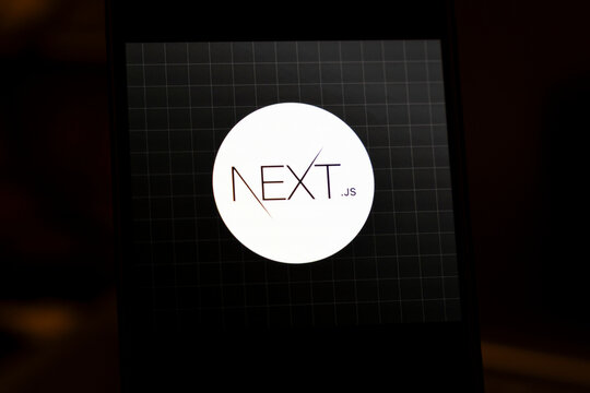Warsaw, Poland - Feb 3, 2026: Next.js logo in a modern, minimalist style against a dark background emphasizes innovation and technology in web development.