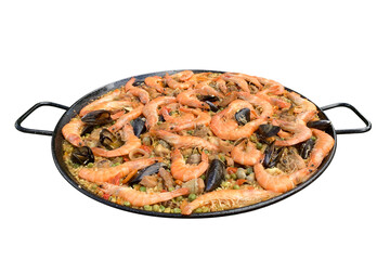 Spanish paella in a black dish with seafood isolated on a white background