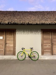 bicycle in front of a house © SAT