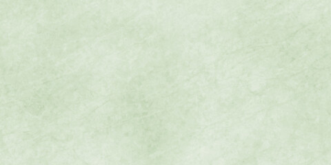 Polished natural granite marble for ceramic wall tiles. soft natural patterns, and a smooth polished stone surface. green paper texture. light green polished plaster rough concrete wall background.