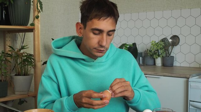 a man has dinner at home after work