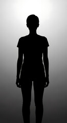 Woman Silhouette Standing Against Gradient Background