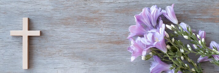 Obraz premium Wooden cross is on a wooden table