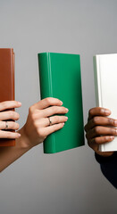 Multicultural Hands Holding Colorful Books