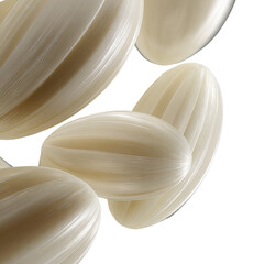 Cluster of shiny, ivory, oblong shapes with fine, parallel texture on black