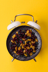 Dried cranberries, yellow and black sweet raisins as ingredients. Raisins and cranberries