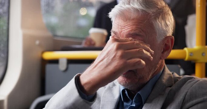 Neck pain, yawning and mature businessman in bus with winter commute burnout, crisis or rain risk stress. Metro, public transport or tired entrepreneur on train with mental health, anxiety or mistake