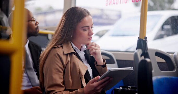 Woman, bus and tablet to browse internet for news update, report and current affairs with commuting to work. Female person, online and social media for communication or networking in public transport