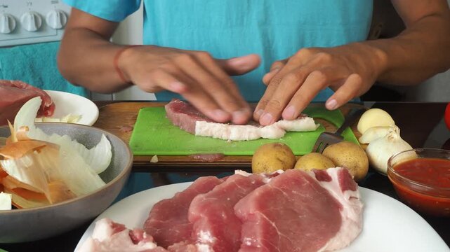 a man cooks dinner after work