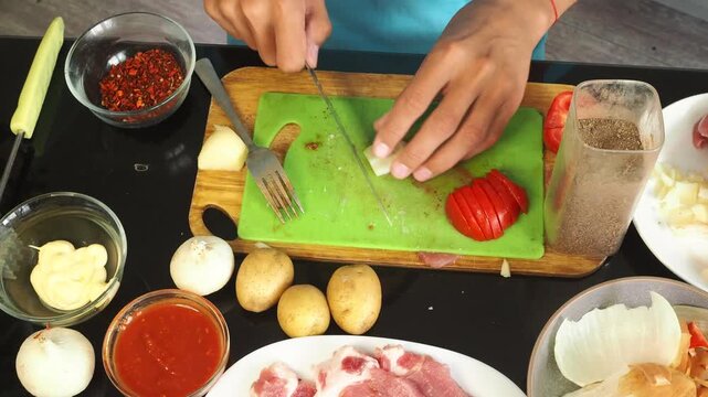 a man cooks dinner after work
