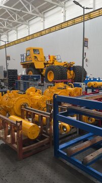 Production process of heavy mining trucks at the BELAZ plant. Dump truck on the Industrial conveyor in the workshop of an automobile factory. Belarus, september 20, 2025