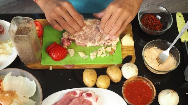 a man cooks dinner after work