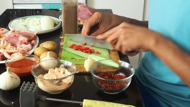 a man cooks dinner after work