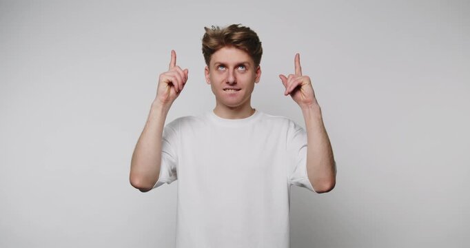 Person shows different hand gestures in four frames with simple expressions on a neutral background indoors