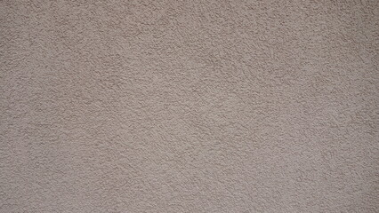 Obraz premium Close-up of textured beige wall surface.