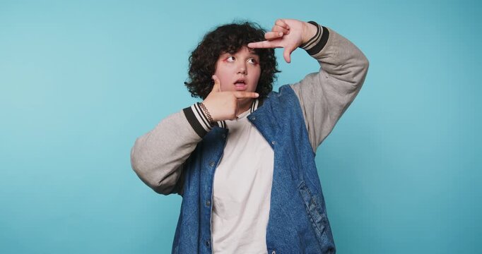 Person points and makes gestures against a blue background in a series of four frames