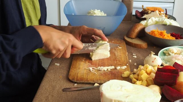 a man making egg sandwiches for breakfast
