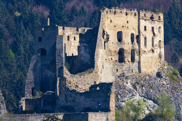 Likavka Castle ruins overlooking forest in Slovakia