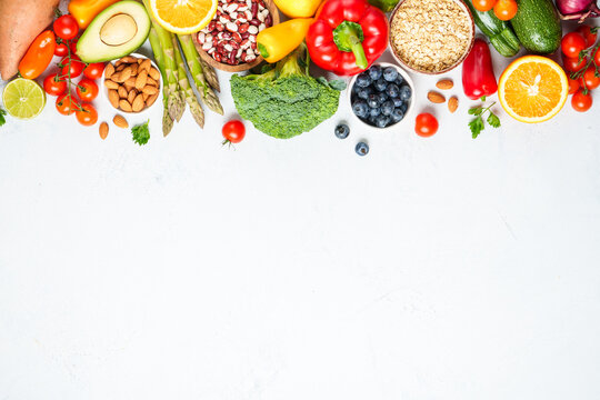 Healthy food assortment on white background.