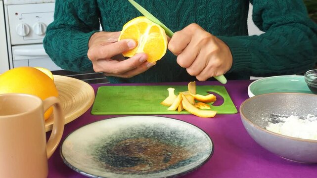 a man preparing a fruit dessert