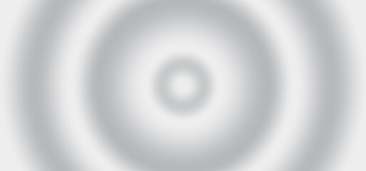 Abstract background featuring smooth, concentric circles creating a ripple effect with a soft gradient from light gray to white, ideal for minimalist design concepts.