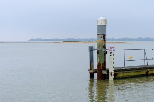 A view of Brightlingsea Harbour Marina Entrance with a view of the depth guage and sill entrance