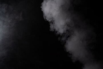 White smoke, fog, and steam creating a mysterious, thick, and ethereal atmosphere on a dark background