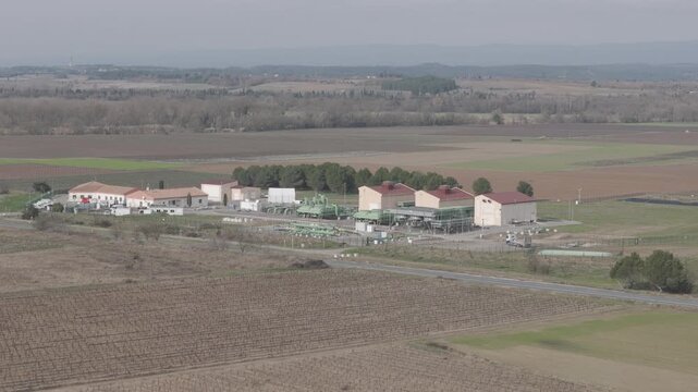 Aerial view of a natural gas compressor station and energy infrastructure in France
