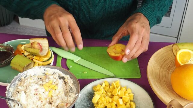 a man preparing a fruit dessert