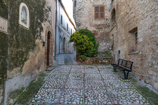 A street among the old houses of Trevi, a medieval village in the Umbria region, Italy.