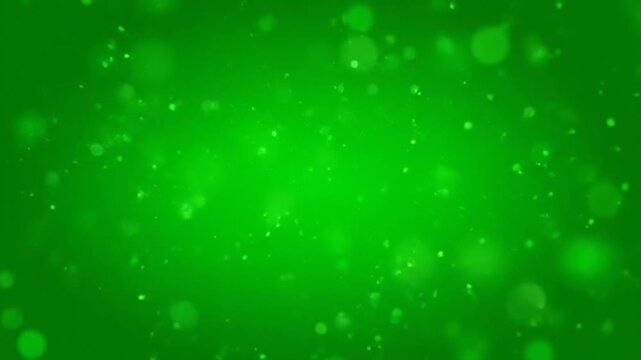 Vibrant green particles dance in a mesmerizing video display of light and energy