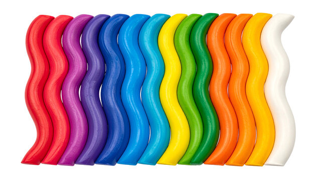 Colorful, wavy, stacked play dough of rainbow hues on a black background
